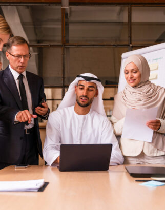 Multiethnic corporate business team meeting in the office for a strategic marketing plan - Office workers, entrepreneurs and company employee at work in a multinational company